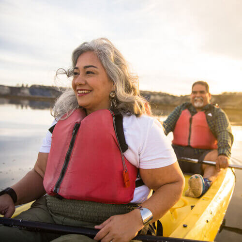 Couple in a kayak on a lake