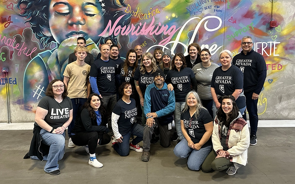 Group photo of Greater Nevada Credit Union employees doing community impact work