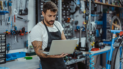 Small business owner on his laptop