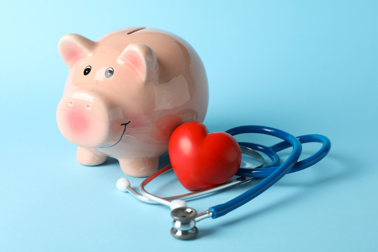 Piggy bank with stethoscope and heart. Understanding GNCU's Health Savings Account (HSA)